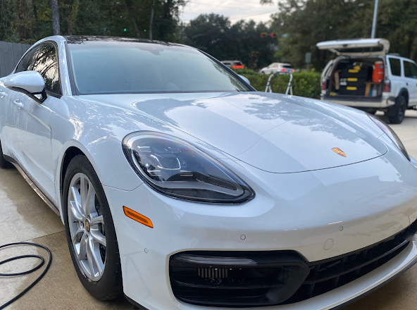 White Porsche sports car detailing