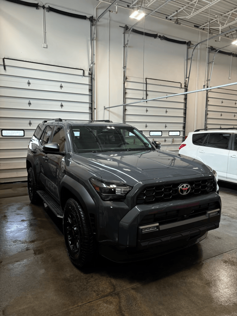 Dark gray SUV in garage